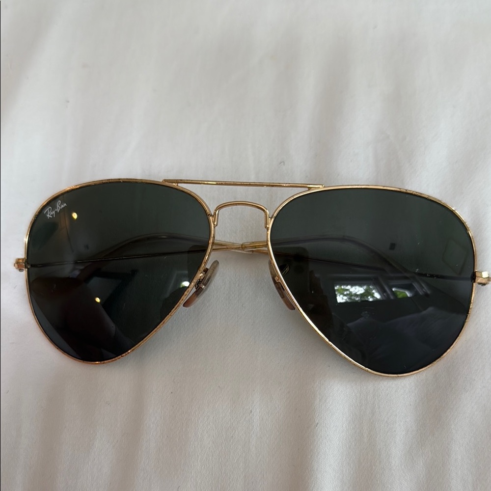 Ray-Ban Aviator Sunglasses. Gold Frame, grayish black lense. Small. No case